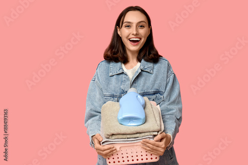 Young woman with laundry ba...
