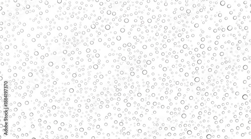 Dense field of circular bubble-like objects scattered across white background, varying in size and shading to illustrate particle distribution, fluid dynamics, and abstract texture for scientific or d