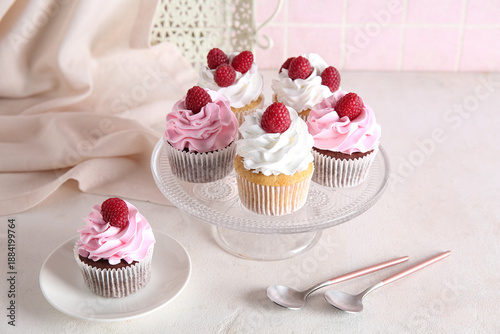 Raspberry cupcakes with pin...