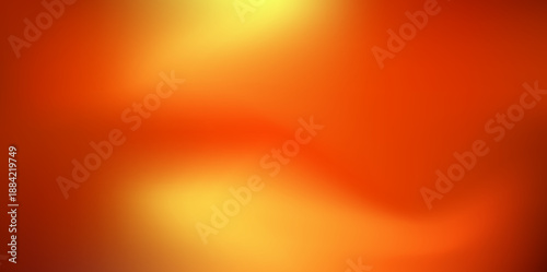 A warm yellow gradient background with sunset hues from yellow to red. The smooth color transitions are reminiscent of a warm autumn sky with a soft. Blurred sunset background. Vector illustration.