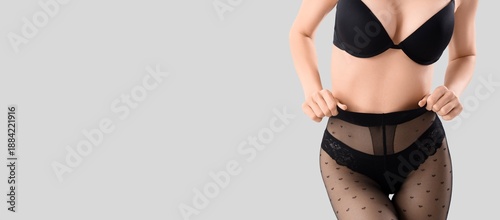 Attractive young woman in b...