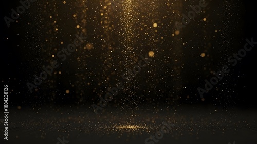 Golden light particles on dark background with bokeh effect