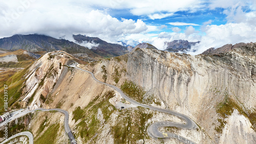 Col du Galibier pass with winding road and breathtaking alpine terrain, Savoie, Auvergne-Rhone-Alpes, France, Europe.