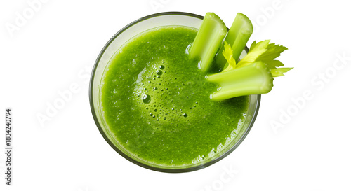 Green smoothie in glass shows bubbly texture against black. Use for health, beverage, or product photography.
