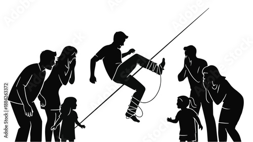 Spectators watch with awe as a performer balances precariously on a tightrope during an outdoor show.