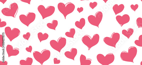 Pink hand-drawn hearts forming a seamless pattern on a white background. Pink heart pattern creating simple love background