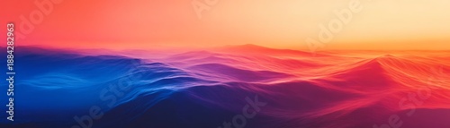 Vibrant desert landscape with undulating sand dunes illuminated by a colorful sunset and gradient sky transitioning from blue to red to orange hues