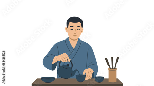 A man in a blue robe pouring tea from a teapot into a cup