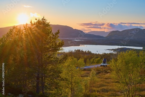 Canvas Print Off road car with roof tent in the wild campground within sunset