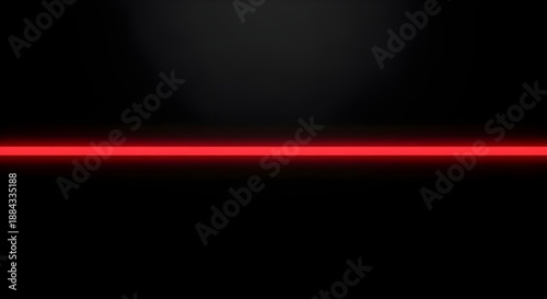 Red laser beam abstract: A brilliant red laser beam slicing through a dark void, creating a visually arresting display of precision and focused energy. 