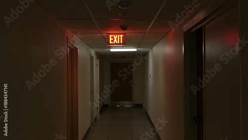 A flickering hallway exit sign