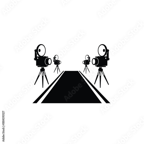 Film cameras on tripods facing each other on road