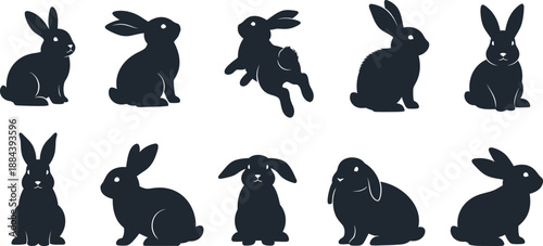 Collection of nine black rabbit silhouettes on white background