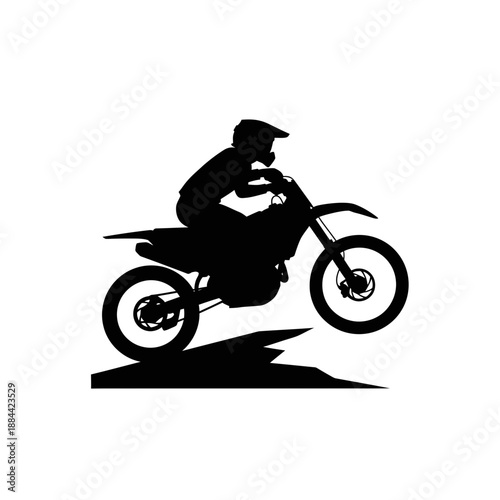 Dynamic motocross rider performing a jump