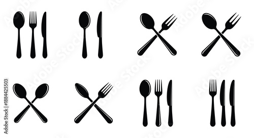 A collection of black silhouette cutlery forks spoons and knives arranged neatly