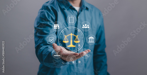 Photos Businessman presenting digital justice scale symbolizing law, legal services, compliance and corporate governance