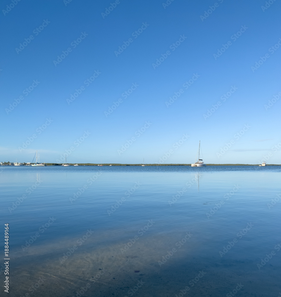 Fototapeta premium Sailboats Anchored in Calm Waters of Key Largo, Florida