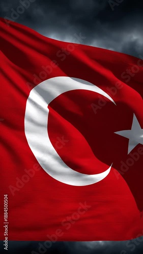 The Turkish flag with the crescent and star is waving vertically.
