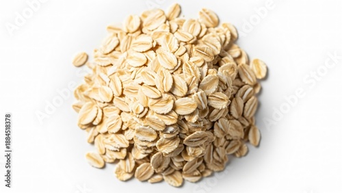 A pile of healthy rolled oats, a whole grain cereal, isolated on a clean white background isolated on white background