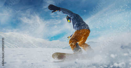 Photos Snowboarder in action. Extreme winter sports.
