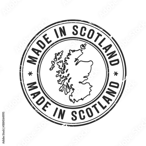 a circular stamp design showcasing the words made in scotland and a map
