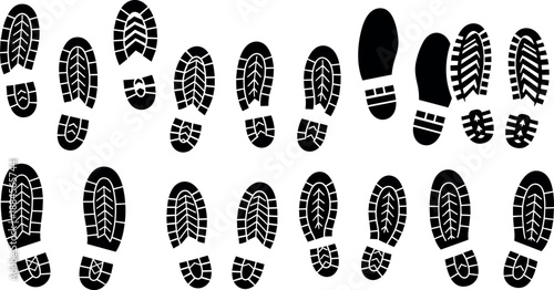 Collection of various shoe prints and footprints isolated on white background