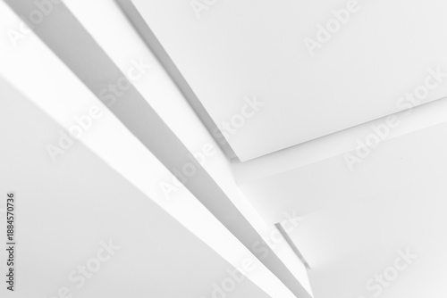 Monochrome abstract photo featuring clean white planes