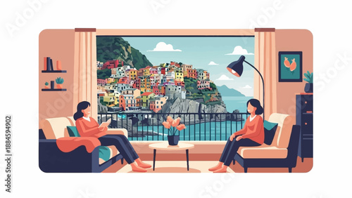 Two people relax on a balcony with a scenic view of a colorful coastal town
