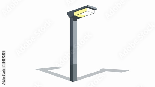Tall grey pole with an illuminated rectangular lamp head casting shadows