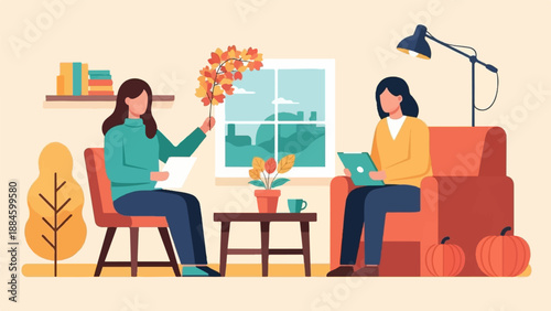 Two women converse indoors with autumn decor and a window view