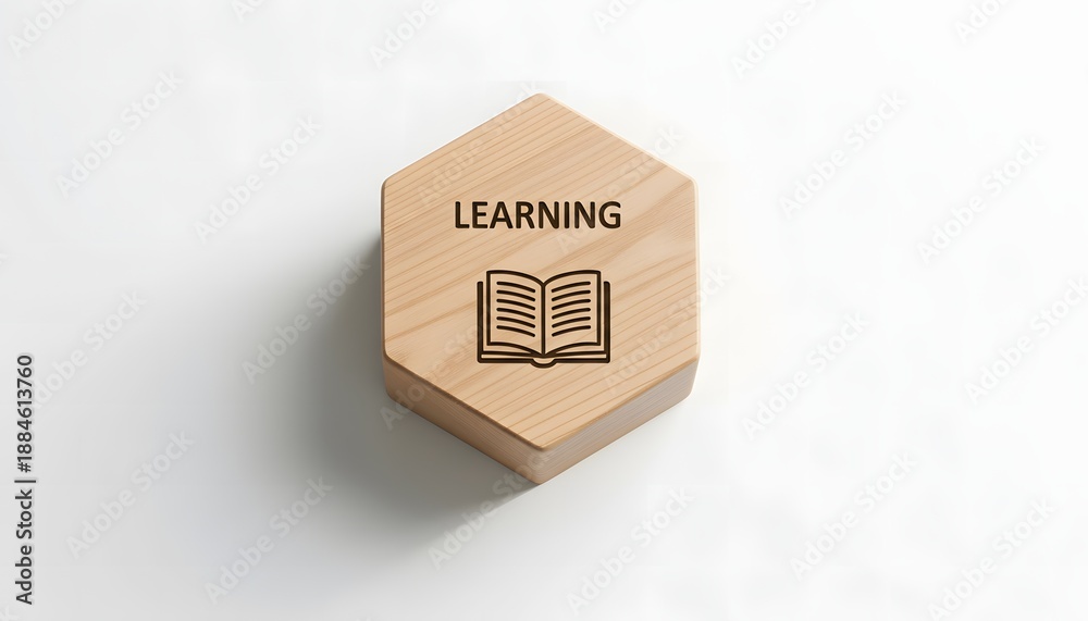 Fototapeta premium Learning Concept with Wooden Hexagon Block and Open Book Icon on White Background