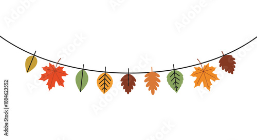 Colorful autumn leaf garland hangs from a thin black string featuring diverse types of foliage in shades of orange, red, and green.