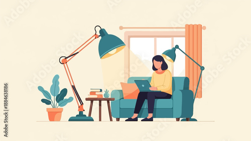 Person sitting on couch with laptop, illuminated by desk lamps