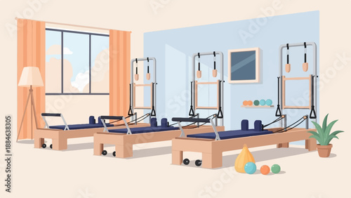 Serene room with pilates reformers and natural light