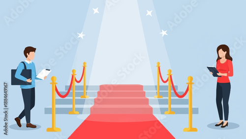 A man and woman stand by a red carpet and stairs, under spotlights