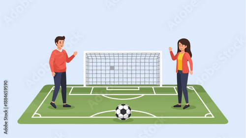 Two people stand on a soccer field with a goal and ball