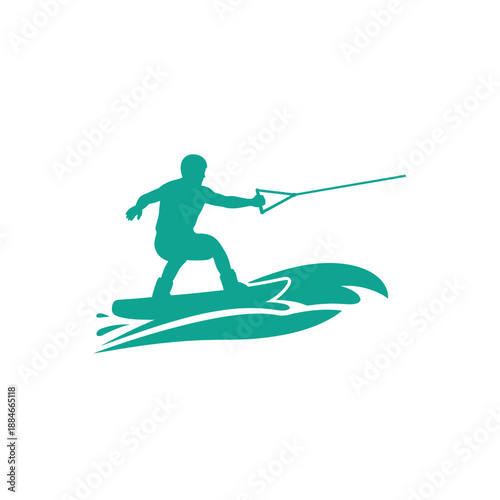 Wakeboarding Silhouette: Man Riding Wave with Teal Turquoise Water Splash