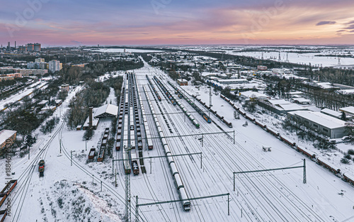 Bilde på lerret Winter city railway yard at sunset