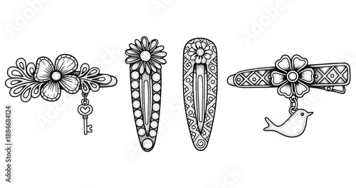 Intricate black and white decorative hair clips with floral and geometric designs