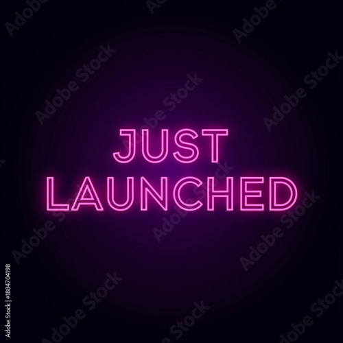 Vibrant Neon Pink "Just Launched" Text Against a Dark, Moody Purple Background, Announcing a New Release