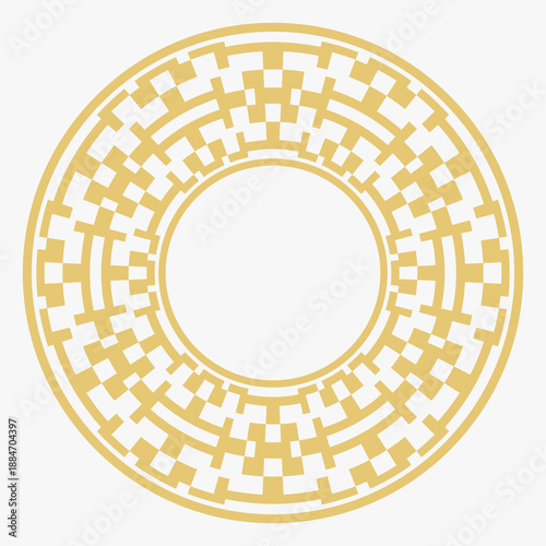 Circular decorative gold ornament.