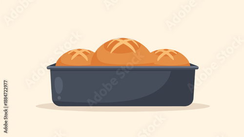 Freshly baked bread in a dark baking pan, ready to be served