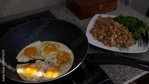 frying pan with fried chicken