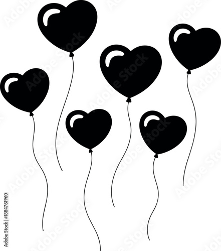 Black heart-shaped balloons with white swirls and strings