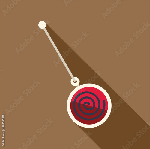 Traditional yo yo toy with string and spiral design on a brown background