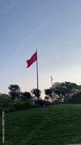 red flag on the green grass