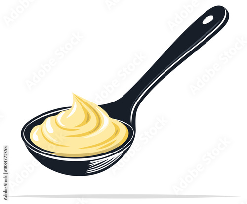 Spoonful of creamy yellow sauce, condiment, or dressing with swirling texture