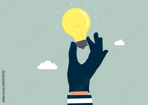Hand in a black glove holding light bulb. Thief stealing lightbulb, burglar with cause problem and failure, poor idea or stupid mistake. Innovation, creativity or thinking about idea, solution to solv