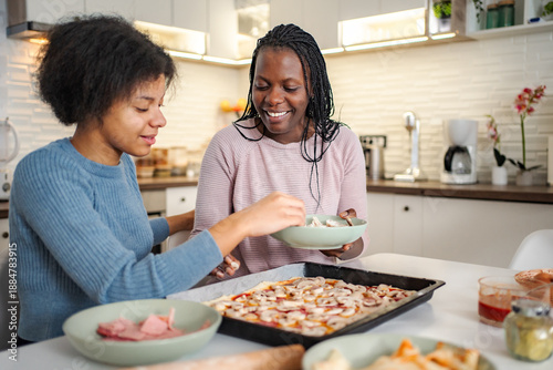 Wallpaper Mural African American mother and daughter making pizza together Torontodigital.ca