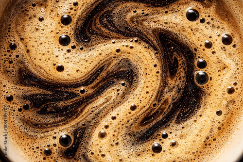 Close-up of coffee surface with swirling crema texture and bubbles